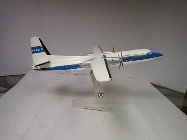 Fairchild Hiller Metal Prop Plane on stand