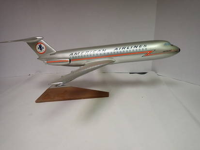 American Airlines Astrojet Model on stand: Heavy plastic Astrojet American Airlines on wooden stand 23" x 8 1/2"