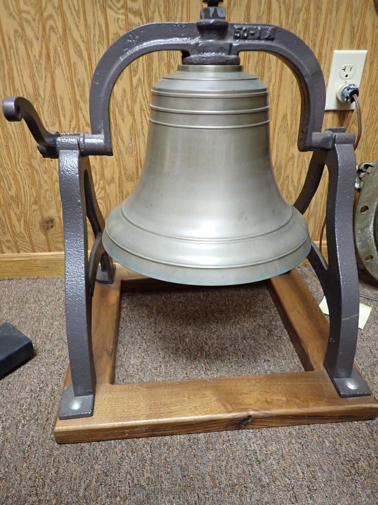 Brass Riverboat Bell from the Che-Mon: This bell was purportedly used on the stern wheel steamboat "Che-Mon" from 1923-65 Named for the Cheat & Monongahela Rivers. Brass Bell with iron yoke mounted on wood. W-17 3/4 H 23" D 16 3/4"