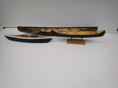 2 Wooden Canoes and 1 Kayak