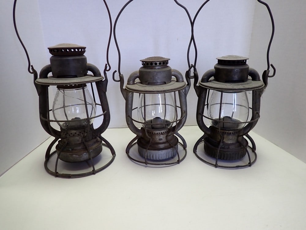 3" B & L.E. Lanterns: Marked "B & L.E.". Stands for Bessemer and Lake Erie. Two marked "Dietz" 10". One "Dietz" different size 11 1/2" and has a cracked globe. All have surface rust.