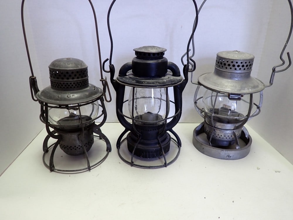 3 R.R. Lanterns: "Armspheare 1926" No R.R. name light wear. "Dressel" "Reading Loco Dept.". "Dietz Vesta N.Y.C.S." Globe has N.Y.C.S. in raised letters, painted black. Has small dents