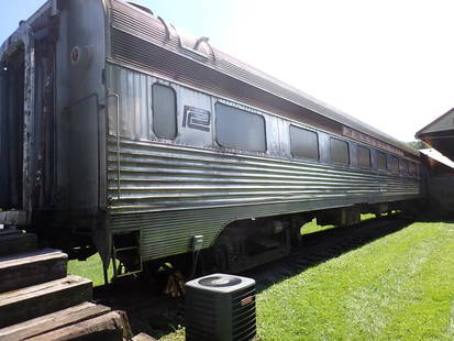 Stainless Steel Budd Car (2421) - Note pick-up terms: No seats, Has A.C./Heating. Car has cosmetic issues and leaks in one corner. Otherwise good condition. Marked 2421. Could be converted into home, AirBnB, Restaurant, etc. Winning bidder needs to provi