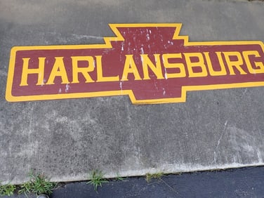 "Harlansburg" Station Sign