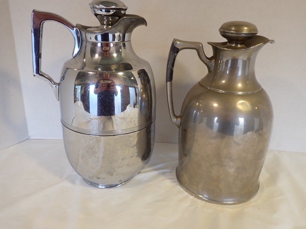 2 Silver Plate Railroad Carafes not marked: One - 10 1/2" Landers, Frary & Clark Co." has some wear, silver plate is worn on handle
