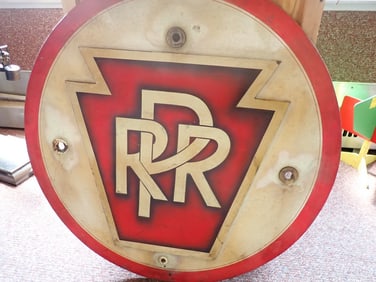 "P.R.R." station sign