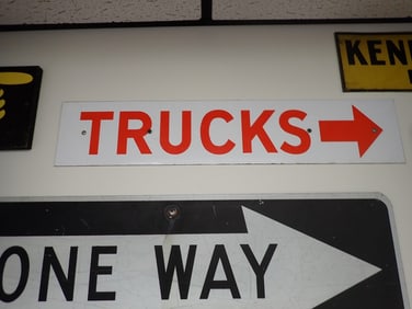 "Trucks" Metal Sign