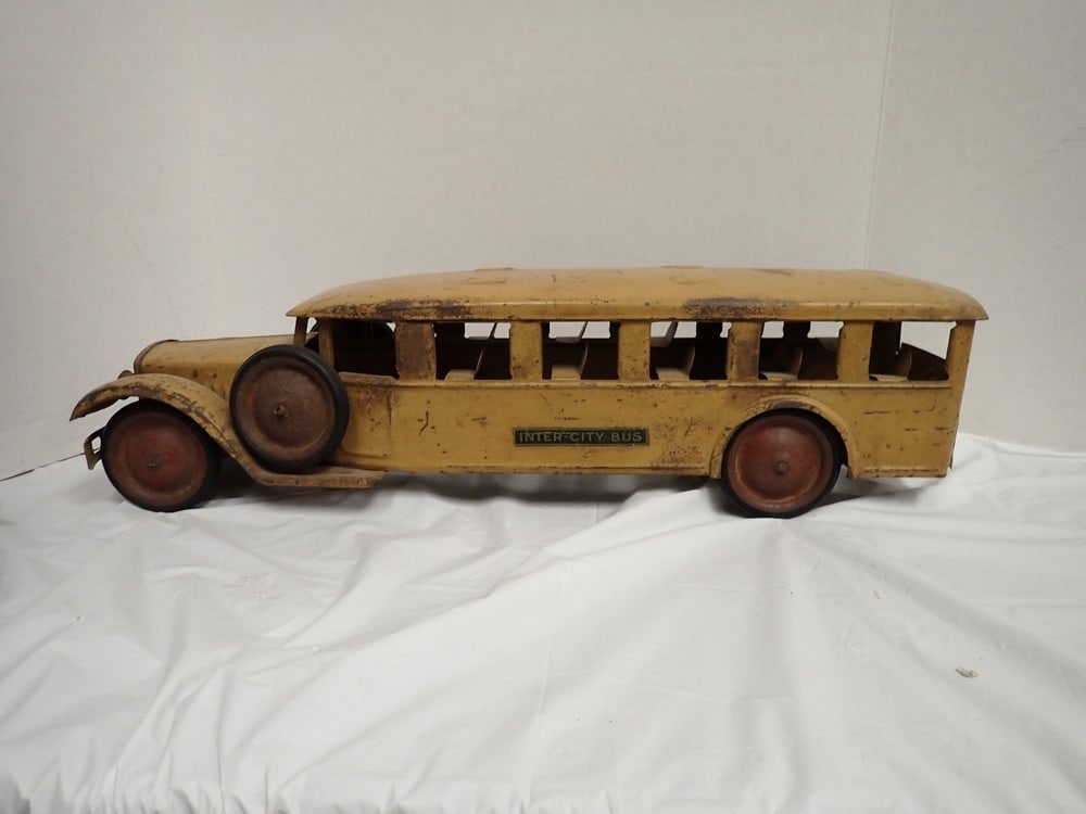 "Steelcraft Intercity Toy Bus" - Yellow Metal: 24 1/2L, Spare wheels, has some surface rust & repair to rear