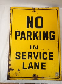 "No Parking in Service Lane" metal sign