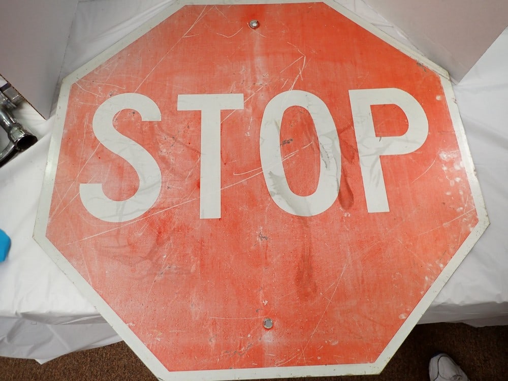 "Stop" sign: weathered & staining, 30"H 30"L
