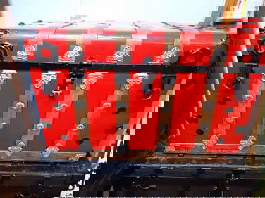 Red Painted Steamer Trunk
