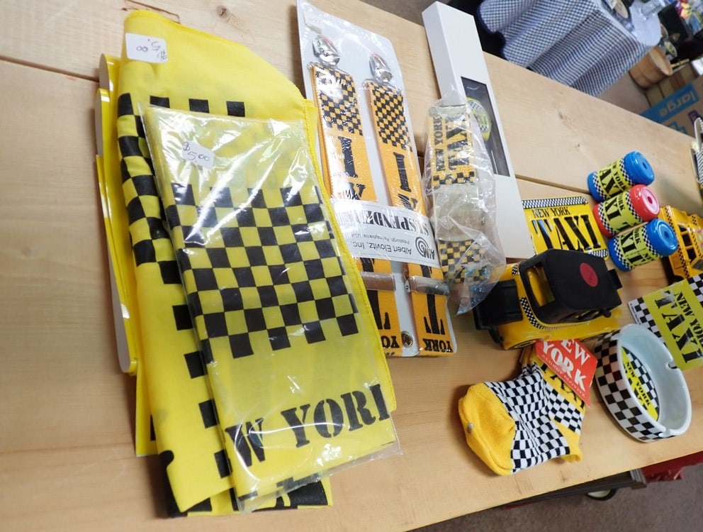 Taxi memorabilia: Bandanas, hats, diecast cars, pencil sharpener, wrist watch etc.