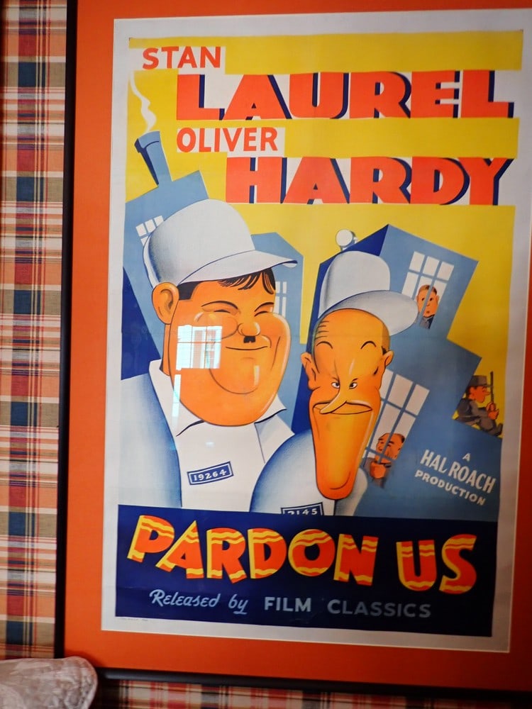 Laurel and Hardy "Pardon Us" Film Classic Release Poster: 8983 Colorful Artistic Image. Frame: 47" x 33". Art: 41" x 27". Some creasing and tearing. Released by Film Classics