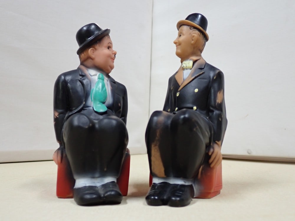 Laurel and Hardy Scarce Squeek Toys Rubber: Hardy Squeaks. Laurel is missing the squeaker. Has a little wear on Hardy. Additional on Laurel with some paint loss. Appr. 6" each.