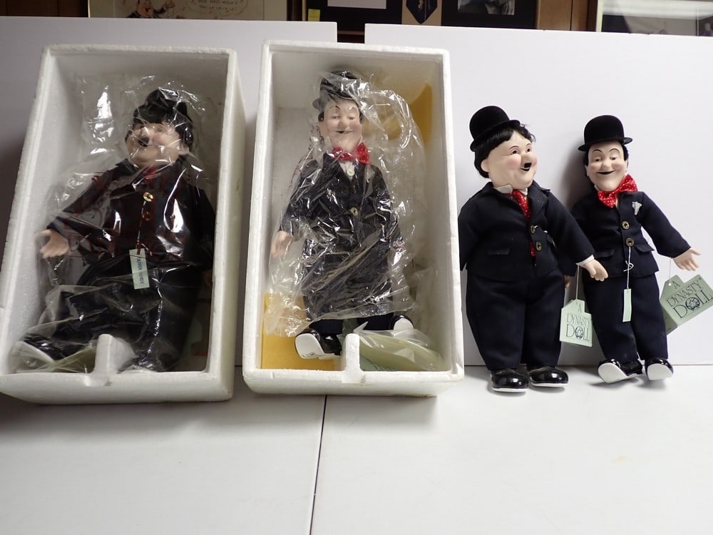 Laurel and Hardy Dynasty Dolls in Boxes: Porcelain Dolls in original boxes. Cardinal, Inc. Larry Harmon Pictures Corp. Lightly soiled but overall good condition. 15"