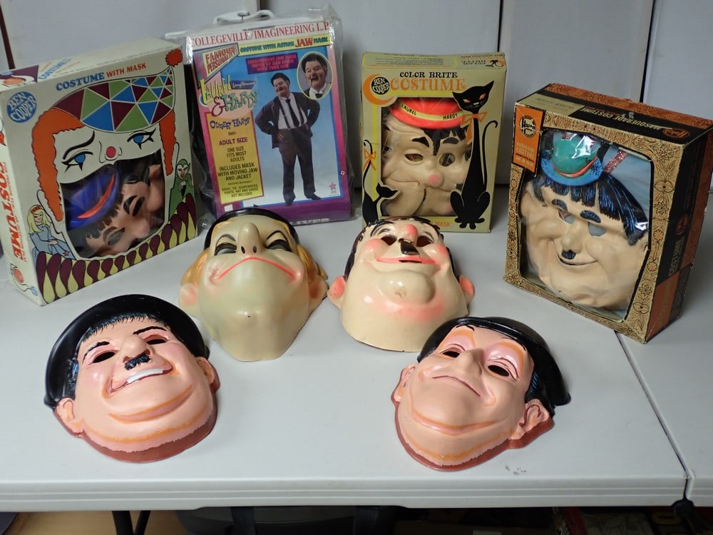 Laurel and Hardy Halloween Costumes and Masks: Ben Cooper 2 Faced Mask and Costume in Box, Halco Hardy Mask and Costume in Box, Ben Cooper Hardy Mask and Costume in Box. 2 Pair of Laurel and Hardy Plastic Masks and a Collegeville Oliver Hardy Cost
