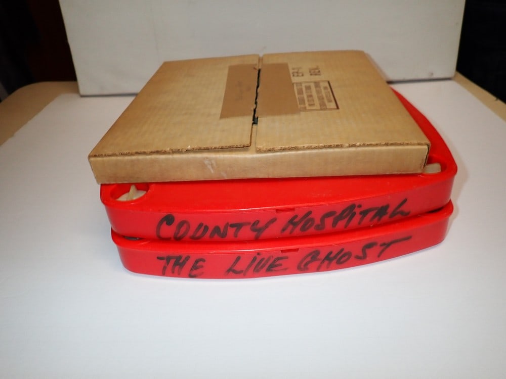 (3) Laurel and Hardy 16mm Film Reels: Cases are marked County Hospital, (2) The Live Ghost (1 marked Part 1). Untested. No noticeable defects noted 10 1/2"