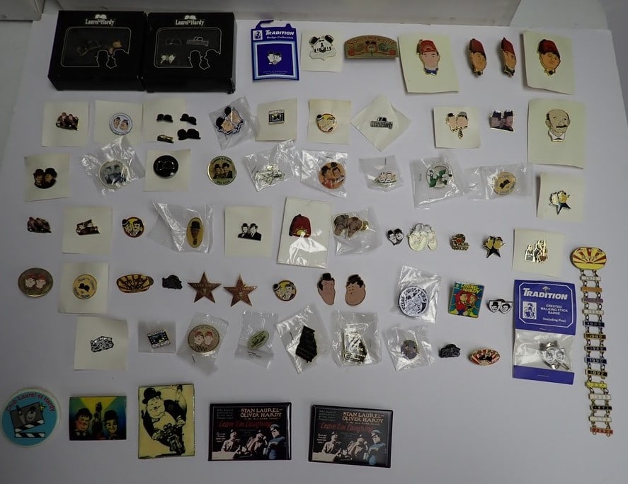 Laurel and Hardy Enamel Lapel and Other Pins: Some in packages. Enamel Stars, Sons of Desert, etc.