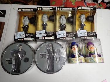 4 Sets of Laurel and Hardy Figures in Boxes