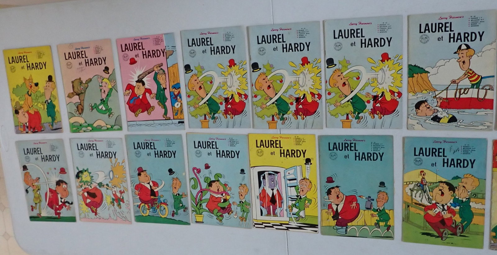 (15) 1960's & 70's Laurel Et Hardy Larry Harmon's Comic Books: 1960's: No. 5, 9, 15, (3) 16, (2) 18, 22. 1970's: No. 23, 25, 29, 30, 32, 35. Front says: France, Belgique, Canada, Suisse and Mensuel. See pictures for condition.