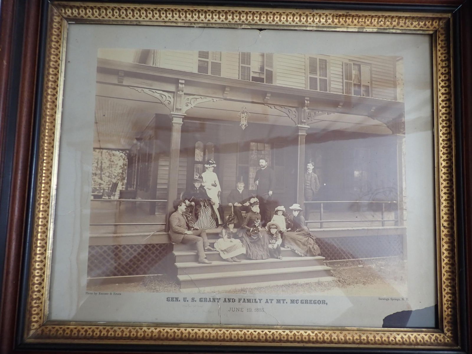 1885 General Ulysses Grant family photo: " Gen. U.S. Grant and Family at Mt. McGregor, June 19, 1885".Photo by Record & Epler-Sarasota Springs, N.Y. In walnut Victorian frame. Frame 20" x 24". Has torn corner and some tearing on bottom.