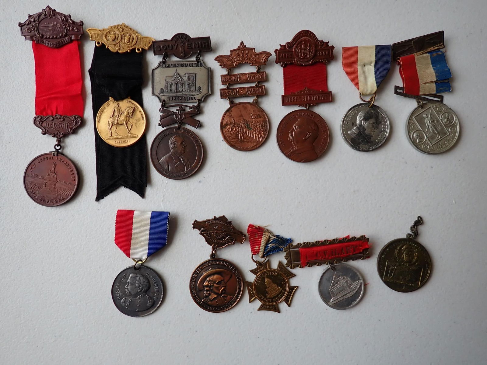 Grant Monument, Custer, Sheridan, & other badges: 1907 General George Custer's Command Reunion badge. Medal for dedication of state park at Battlefield at Osawatomie, Kansas.