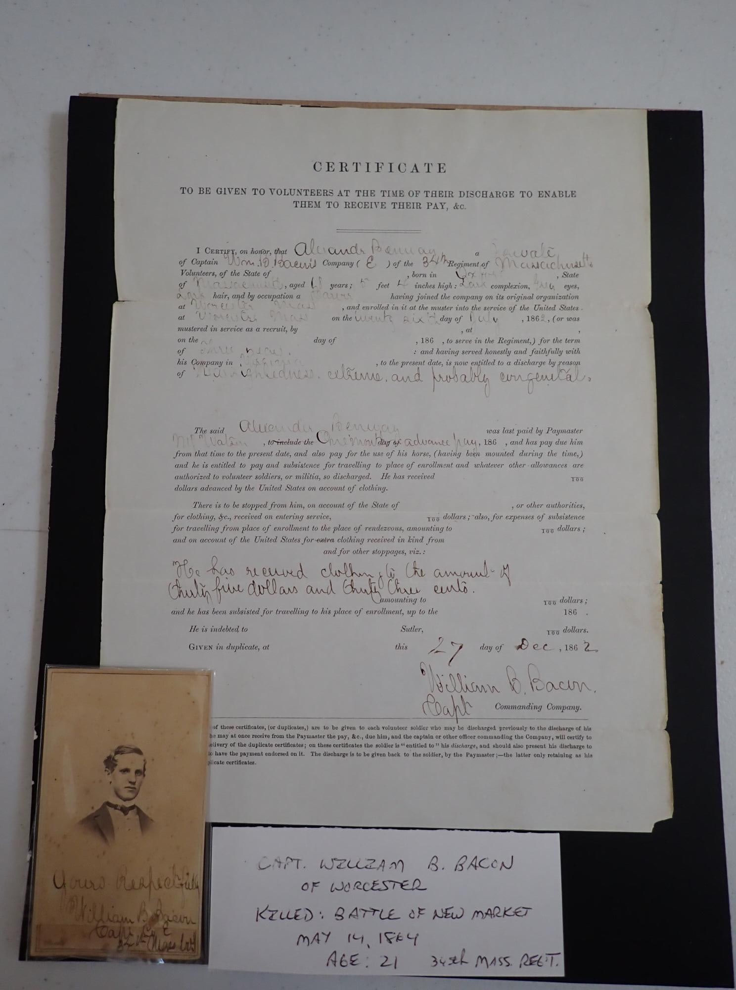 Capt William B. Bacon Worcester CDV & document: Captain William B. Bacon Worcester, MA CDV and signed document. Discharge document of Private Alexander Bowman of Co. E, 34th Regt Mass Vol. Signed Dec. 27, 1862 by William B. Bacon, Captain. Has CDV