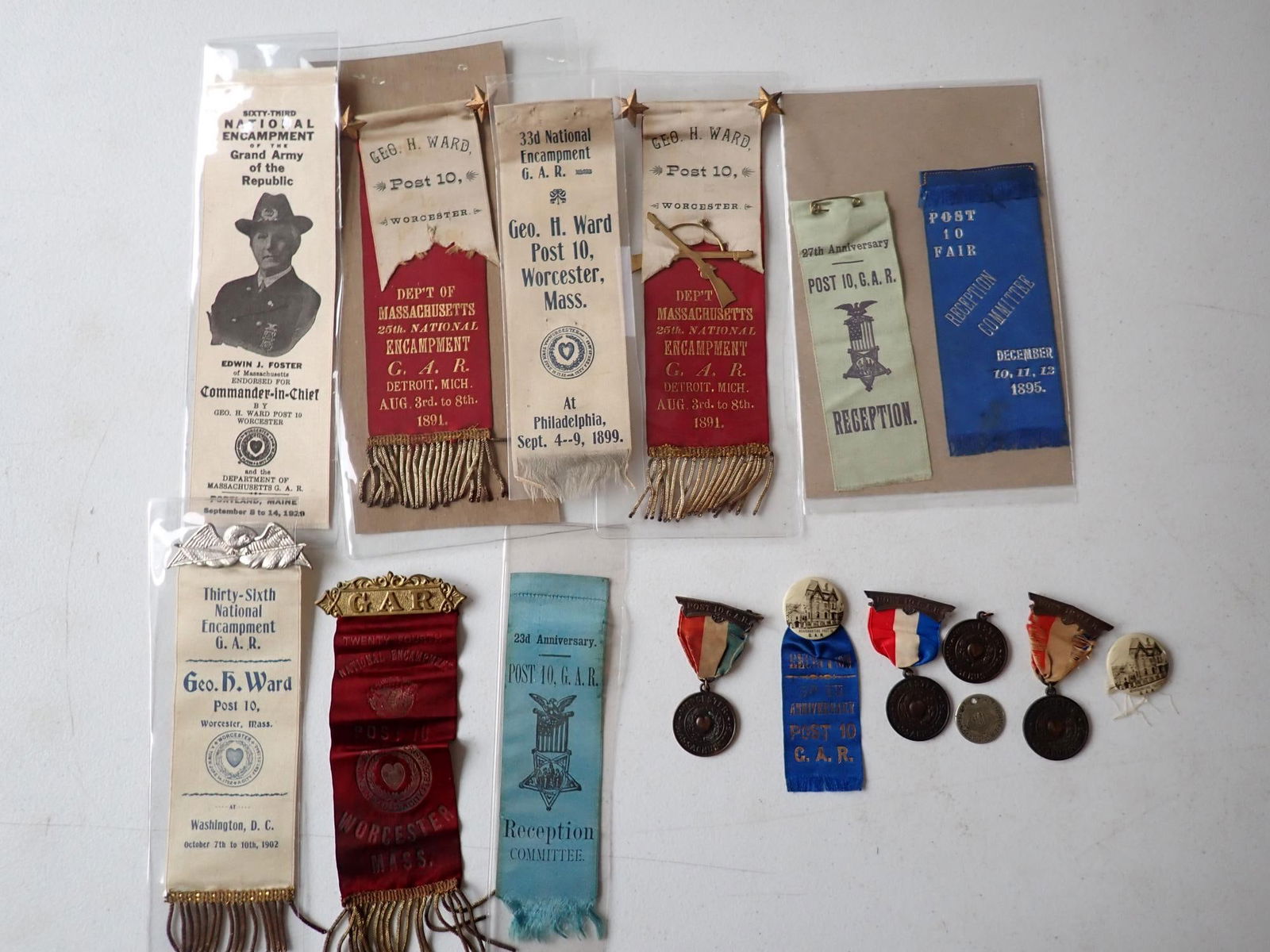 Worcester GAR Post # 10 Ribbons & Medals: GAR medal with heart design, encampment ribbons, etc.