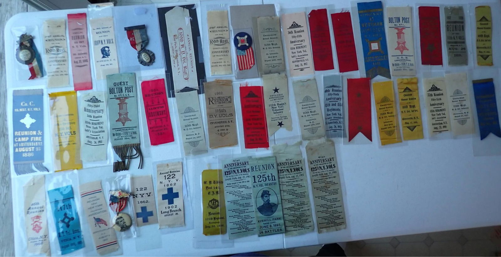 New York 125th and other Veterans ribbons: 125th reunion ribbon shows including battles at Gettysburg, Harper's Ferry, etc.