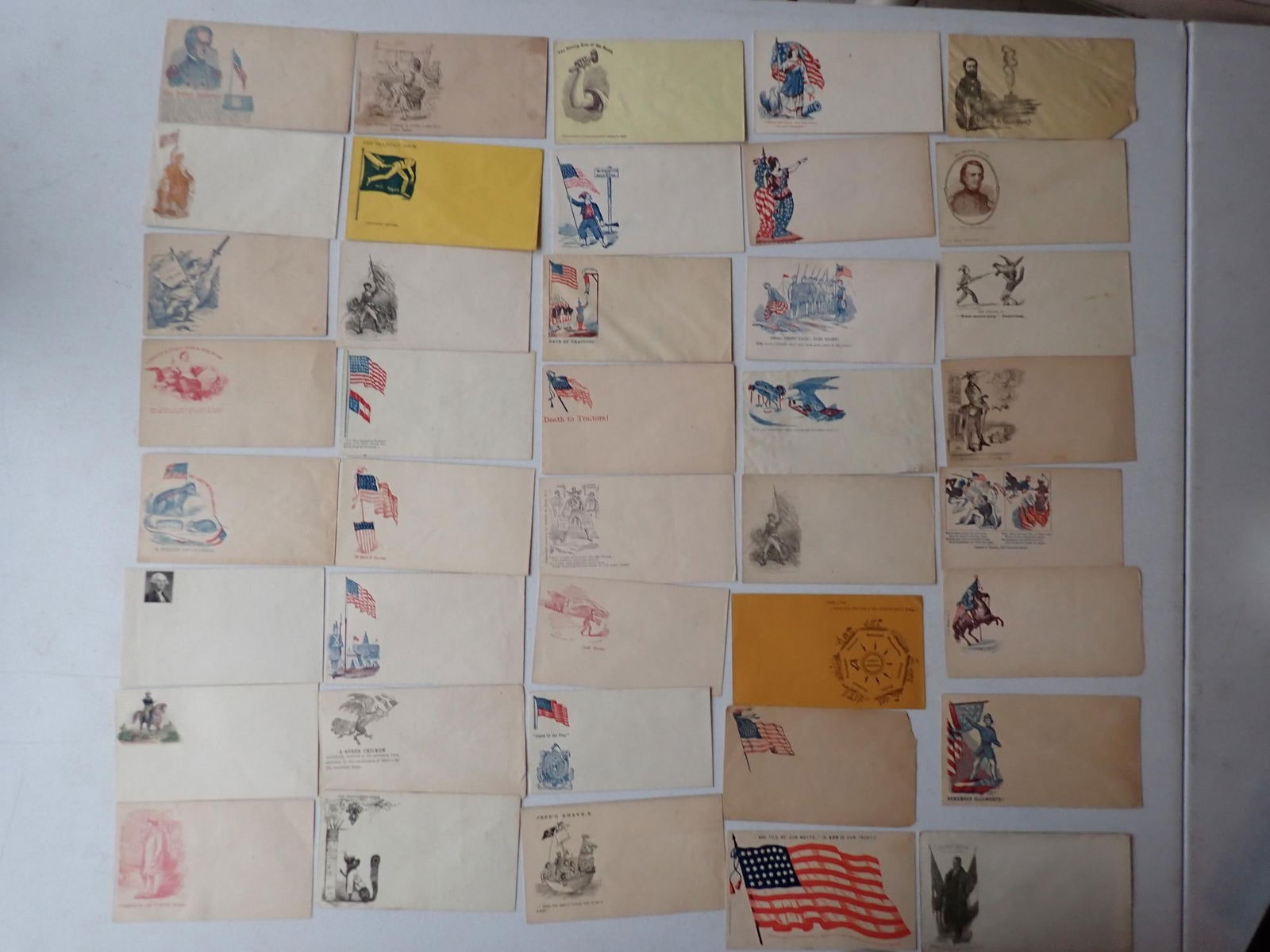 Unused patriotic postal covers: Colonel Robert Andrews, Death to Traitors, and others