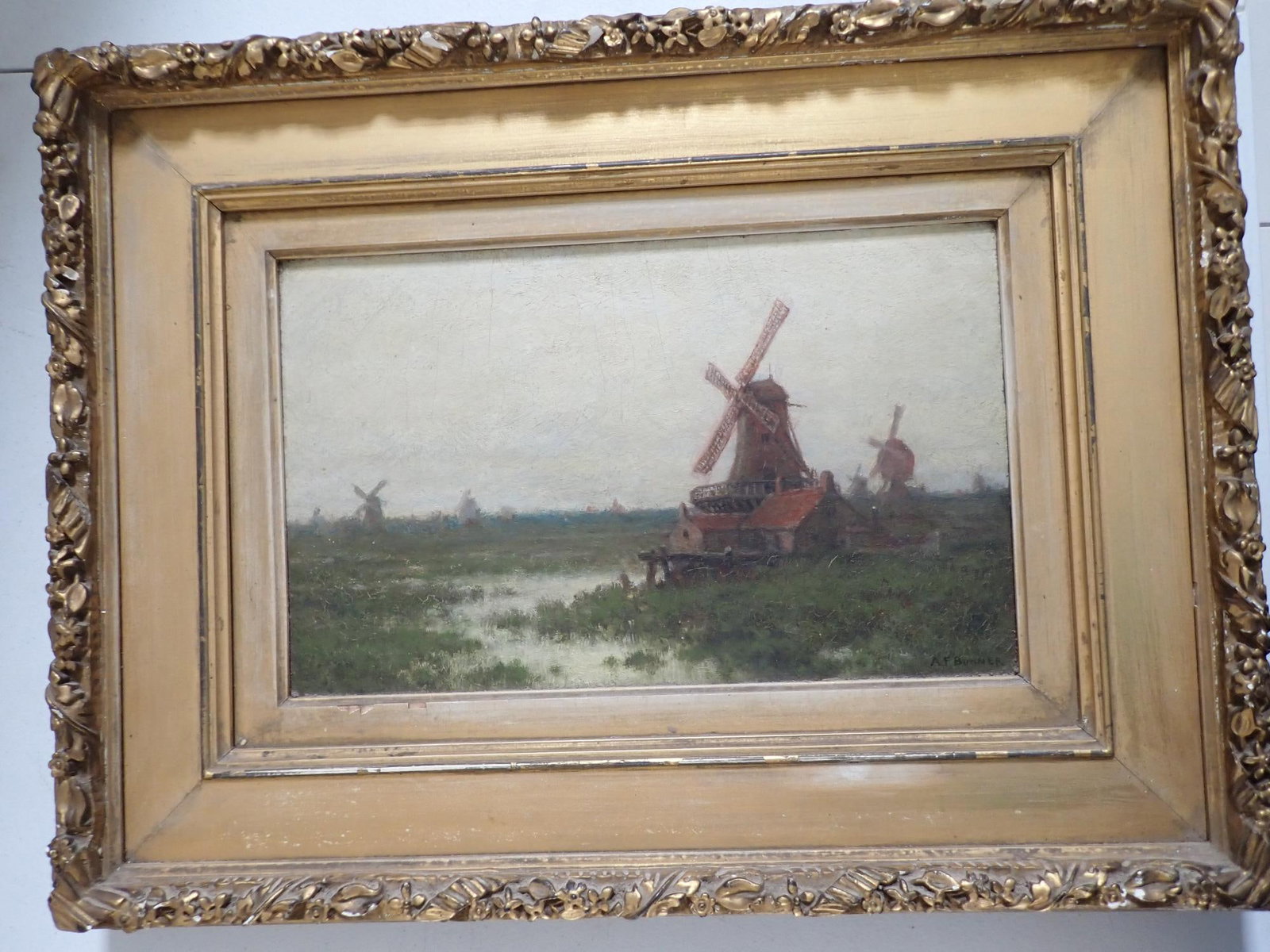 AF (Andrew) Bunner Windmill oil on canvas painting: Art 10" x 16." Frame 18 1/2" x 25." Frame has some chipping. Some cracking of paint Andrew Fisher Bunner ANA 1841-1897. Andrew Fisher Bunner was born in 1841 in New York City, and he studied there and