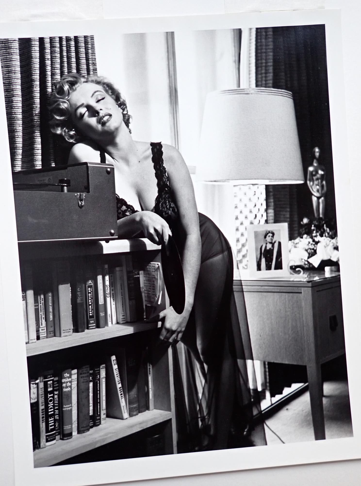 Marilyn Monroe in Negligee by Halsman: Philippe Halsman silver gelatin print of Marilyn Monroe listening to music. 14" x 11" and matte is 20" x 16." Limited edition 12/250.