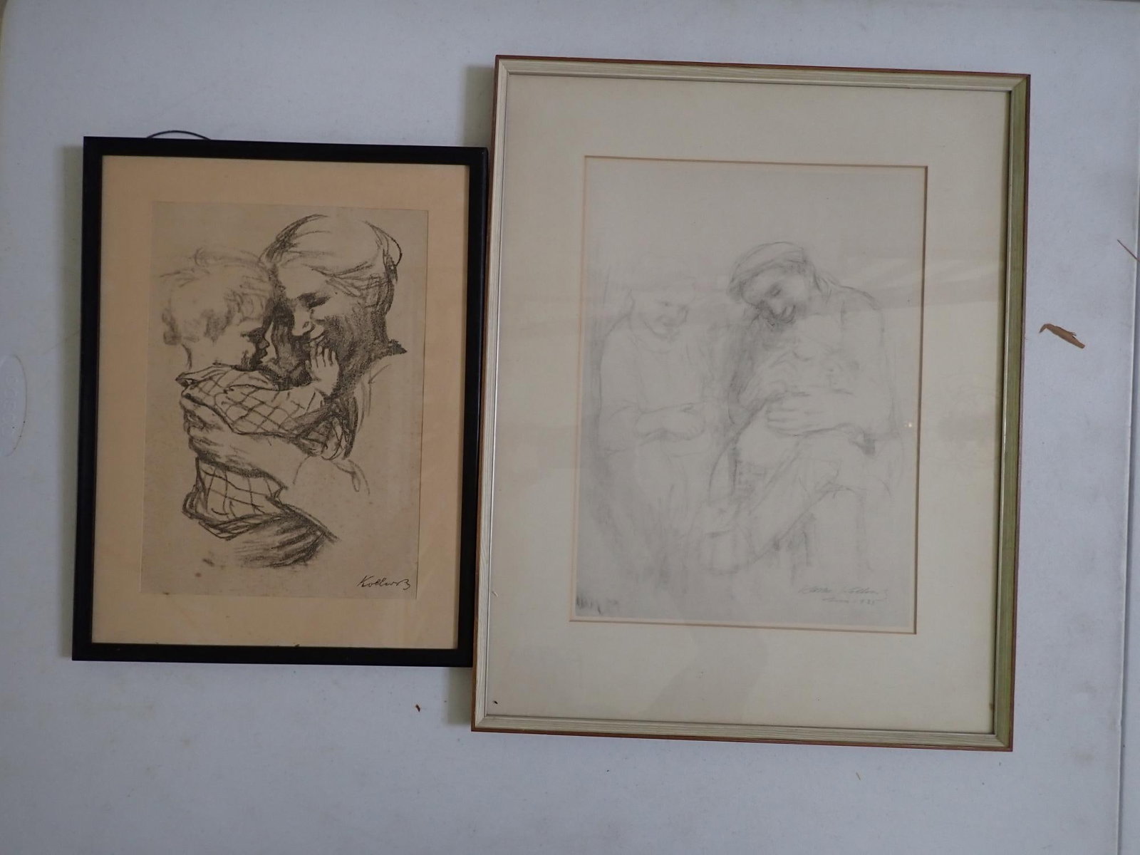 Kathe Kollowitz Mothers & Family Prints: Familie" Collotype Art 14" x 10 1/4" (excluding matte). Frame 20" x 16." "Mutter and Kind" Lithograph. Art 12" x 8 1/2." Frame 15 1/2" x 12.