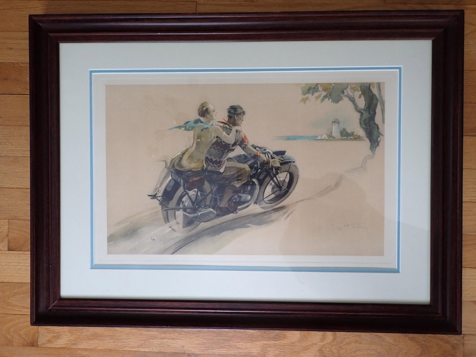 Couple on Motorbike Lithograph by Geo Ham: Circa 1930. Art approximately 13 1/2" x 21" (excluding matte). Frame 21" x 28."