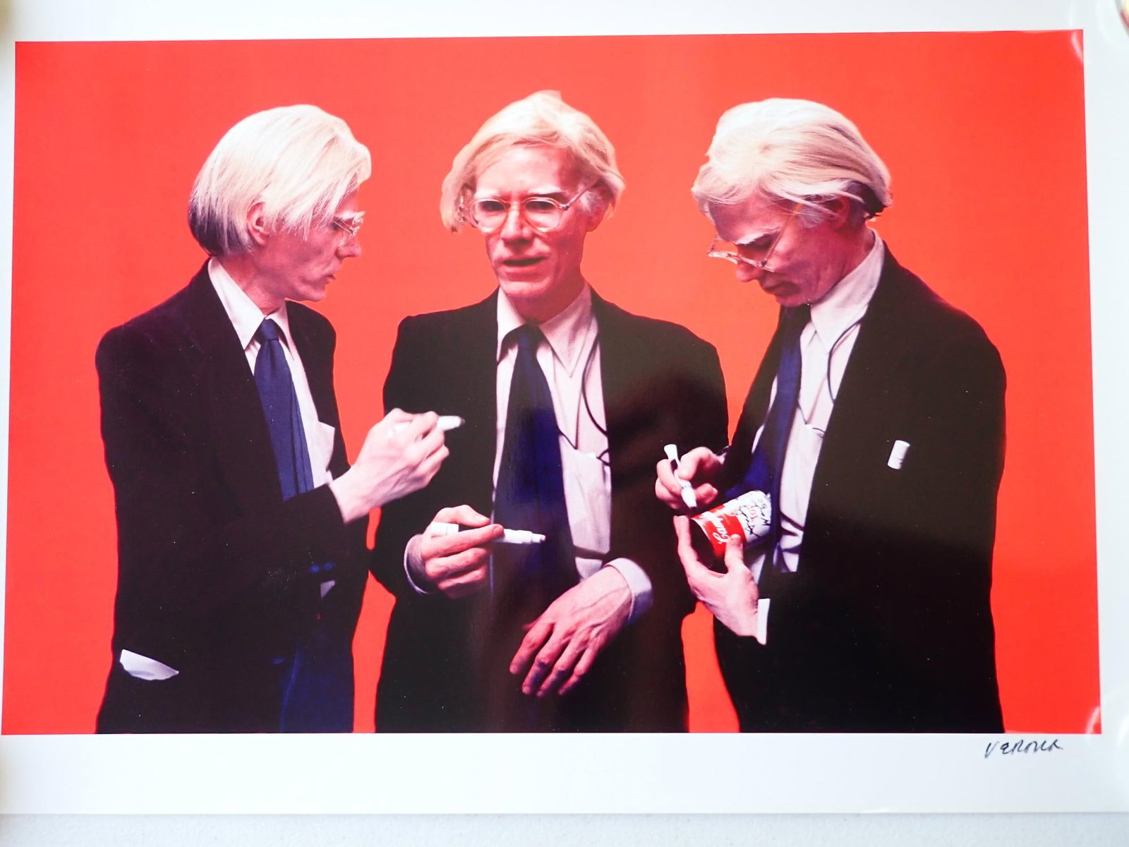 Stephen Verona "Andy Warhol The Signing": Stephen Verona, photograph, 1977, Stephen Verona (American, b. 1940), "Andy Warhol, The Signing", photograph, signed "Verona" lower right, 19"w x 13."