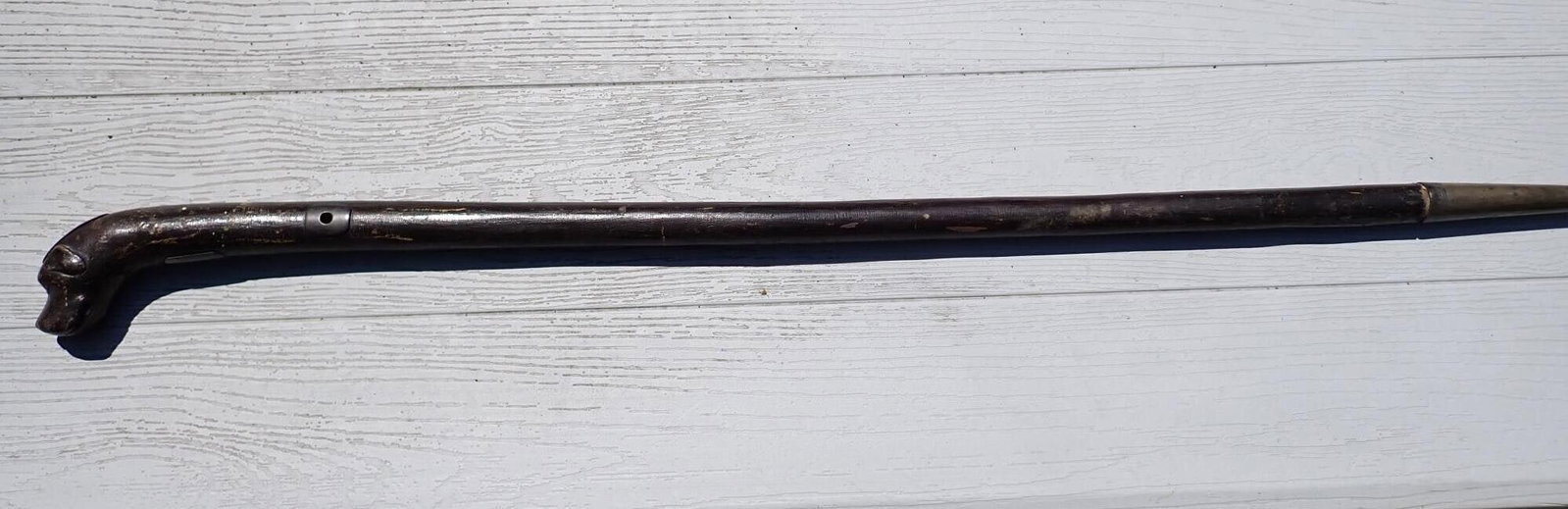 Presentation Cane from Henry Clay Tree: Dog Head cane with plate marked "Cut on the farm of Henry Clay March 7, 1842." Other plate is marked "To H. Yerkes from Cap't Leiphait." Approximately 36." Normal wear