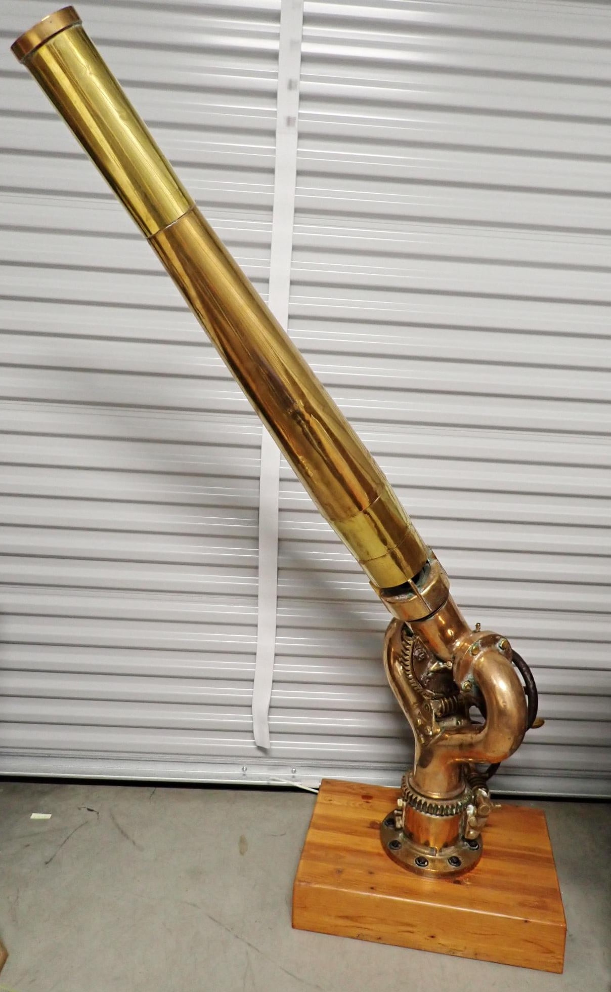 Brass & Copper Antique Ships Water Monitor: It is 5'6" excluding wooden base. Copper and brass base with gears 28". Brass nozzle 47". Gears turn to raise and lower and rotate the nozzle to aim. Water cannon - fire monitor search terms.