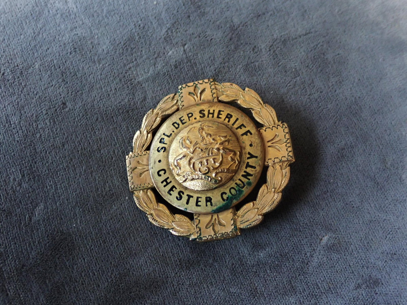 Brass Special Deputy Sheriff Chester County Badge: Antique. Engraved with Floral Design Appr. 1 3/4" Diameter. Some Staining around the word county.