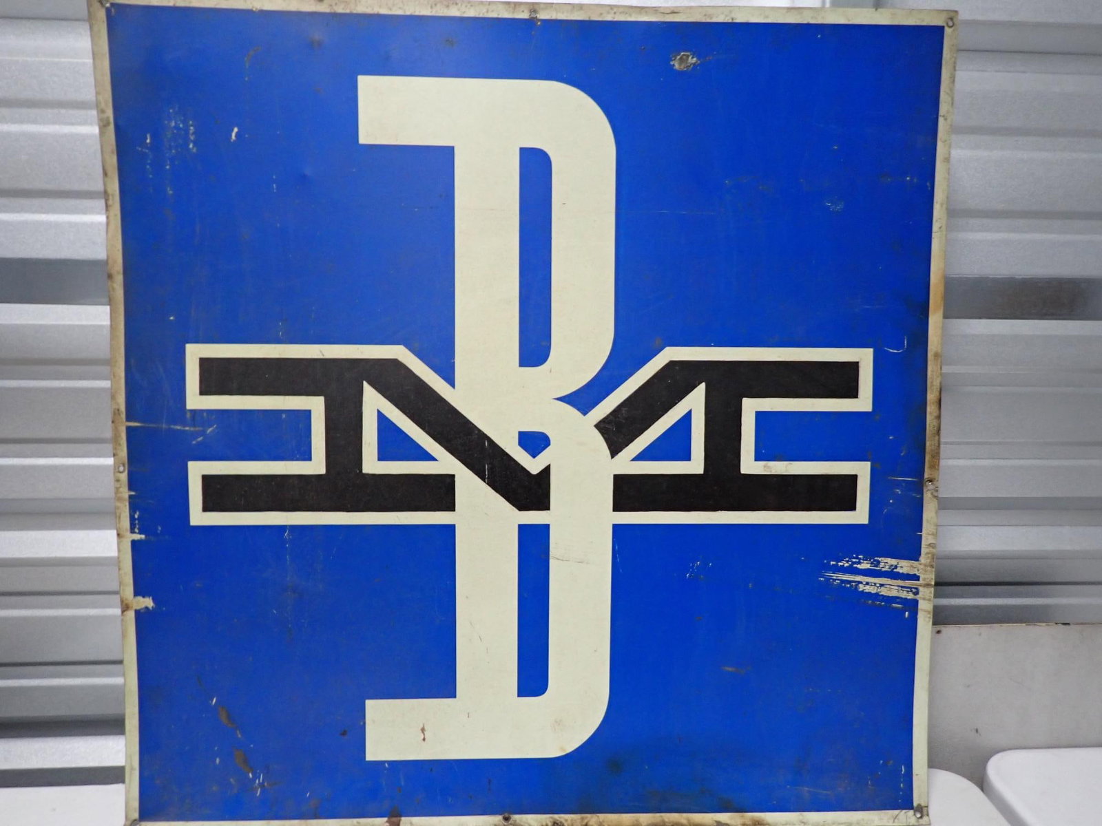 Boston and Maine Railroad Sign: 36" x 36". Metal Sign. Has some wear with scuffs but displays well.
