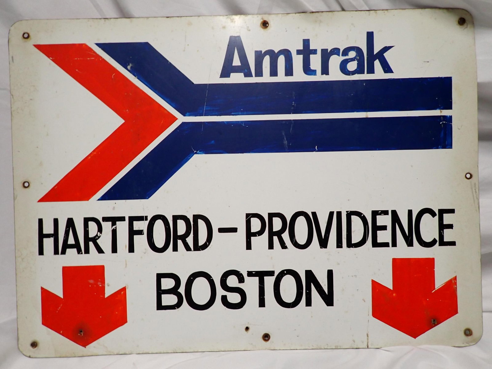 Amtrak Station Sign: Metal Sign has Amtrak logo and is marked Hartford-Providence, Boston. 16" x 22". Some wear but displays well.