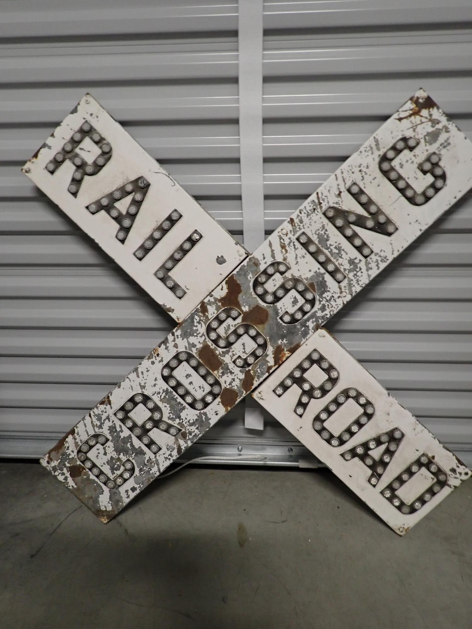 Railroad Crossing Cats' Eye Sign: 48 1/2" x 48 1/2". All Cats' Eye Reflectors are there. Has some rust and wear but otherwise good condition.