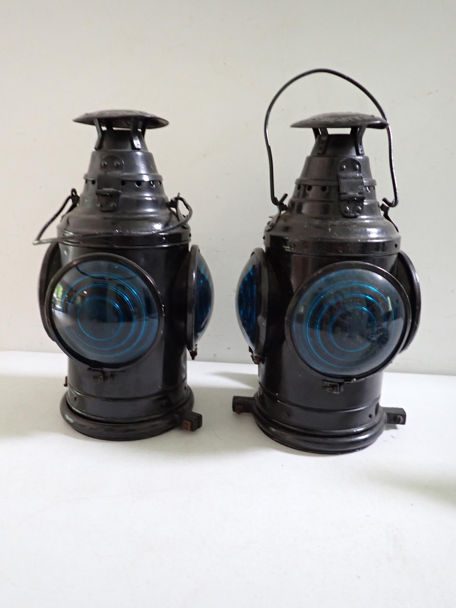 Pair of Dressel Caboose Lanterns: Globes and burners intact. Some denting on top but overall, good condition. Not marked with railroad name.