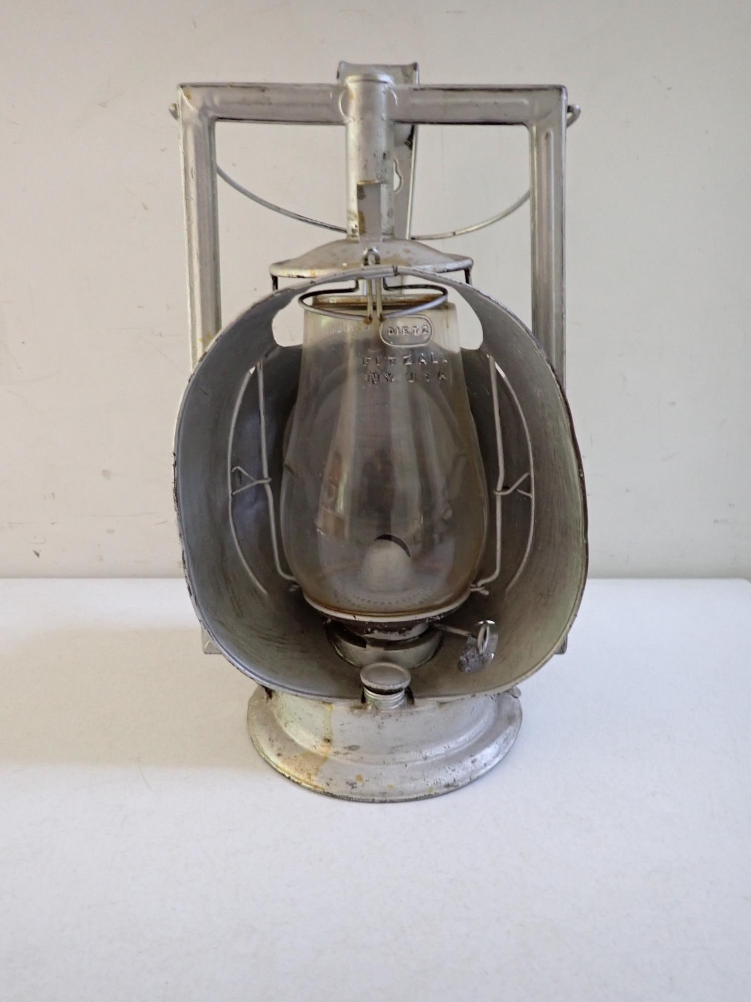Lehigh Valley Railroad Dietz Inspector Lamp: Dietz Acme Inspector Lamp. Handle is marked LVRR Painted silver. Some denting. 14" high. Silver paint.