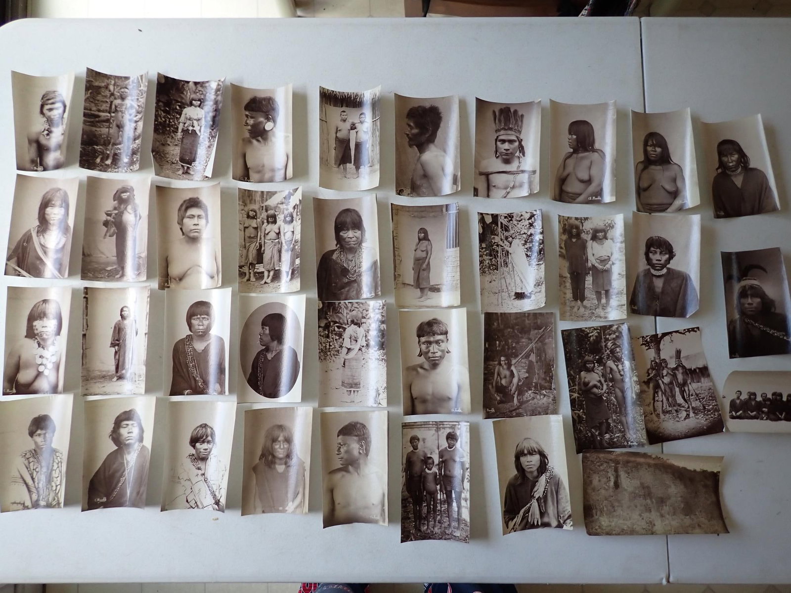Amazon tribes photos from rubber industry: 38 Photos from early 1900s rubber industry in South America. Albumen images mainly 5 1/2" x 4." Many have descriptions written in pencil on reverse. Some are described as "cannibles" (cannibals). One