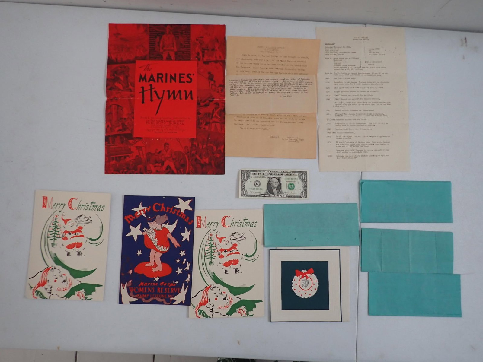 Hiroshima Bombing Letter, Camp Lejeune, ephemera: Camp Lejeune Press Release after the Atomic Bombing of Hiroshima & other releases.U.S.S. Maryland Orders for the Day November 20. 1943. May 8, 1945 note, "President Truman has proclaimed the
