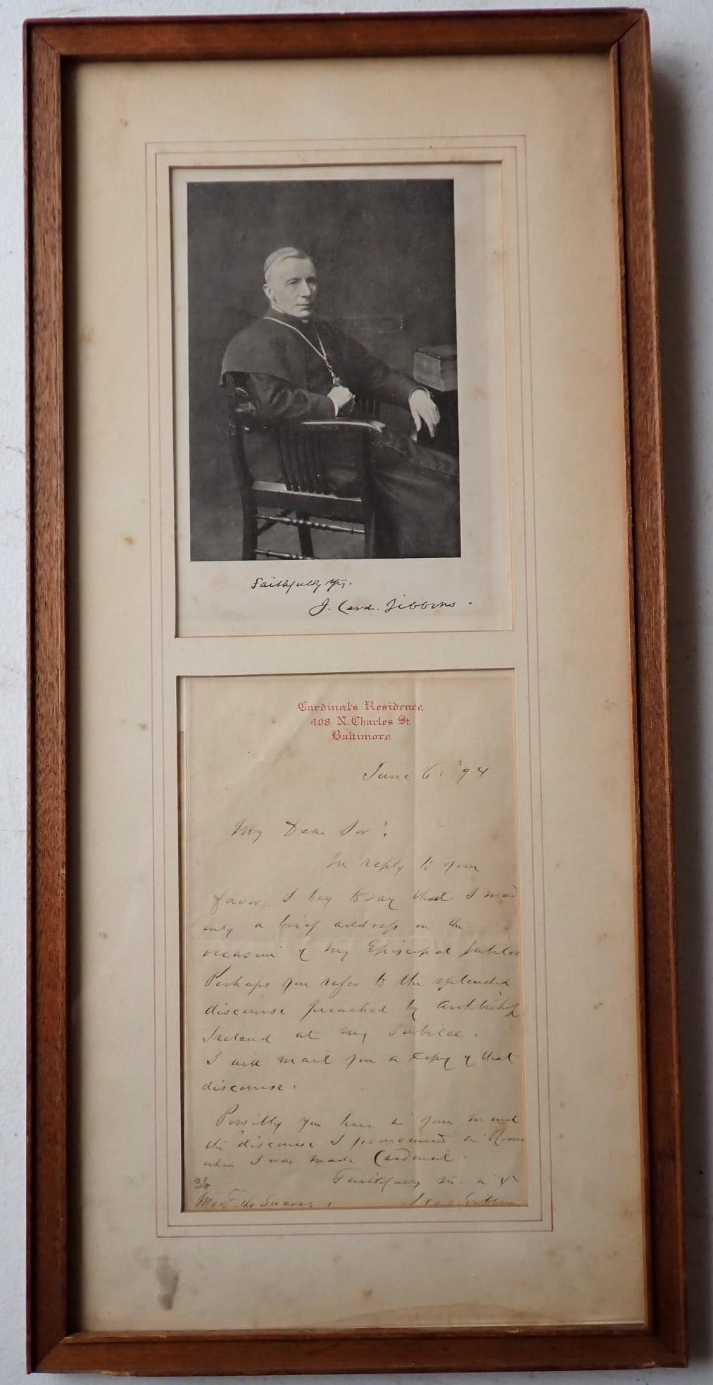 1894 signed letter by Cardinal Gibbons, Baltimore, MD: Letter on Cardinals stationary dated June 6th '94. Answering someone's question about a recent jubilee. Also has print of Cardinal w/ facsimile signature. Frame 17" x 8". Letter 6 3/4" x 4 1/4". Some