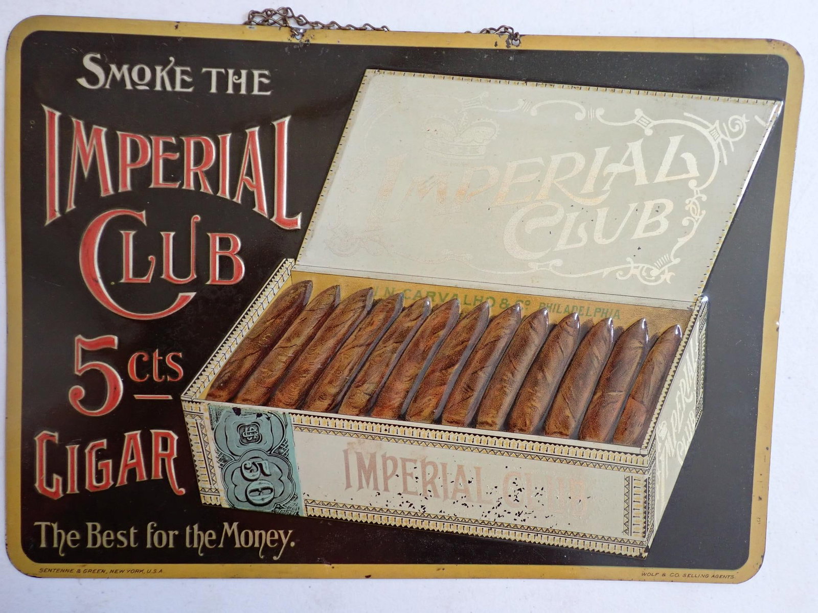 Imperial Club 5 cents Cigar Tin Advertising Sign: "Smoke the Imperial Club 5 Cts Cigar. The Best for the Money." embossed tin sign. "Senteene & Green, New York, U.S.A. Wolf & Co. Selling Agents." 10" x 14" Some paint chipping noticeable