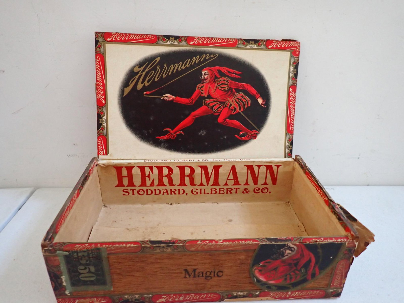 Rare Magician Alexander Herrmann Cigar Box: Hermann cigar boxes rarely come to auction. This is the only one we found with these 4 images of him on the box. Color lithographed Alexander Herrmann label on its interior, the font side and right