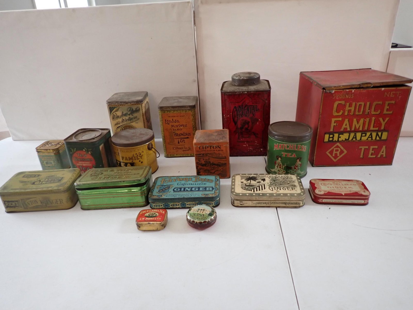 Tea and Ginger Tins: Choice Family Tea B.F. Japan 8" x 8" x *' largest. Gold Camel Tea 1 3/4" x 2 1/4" x 3/4" smallest.