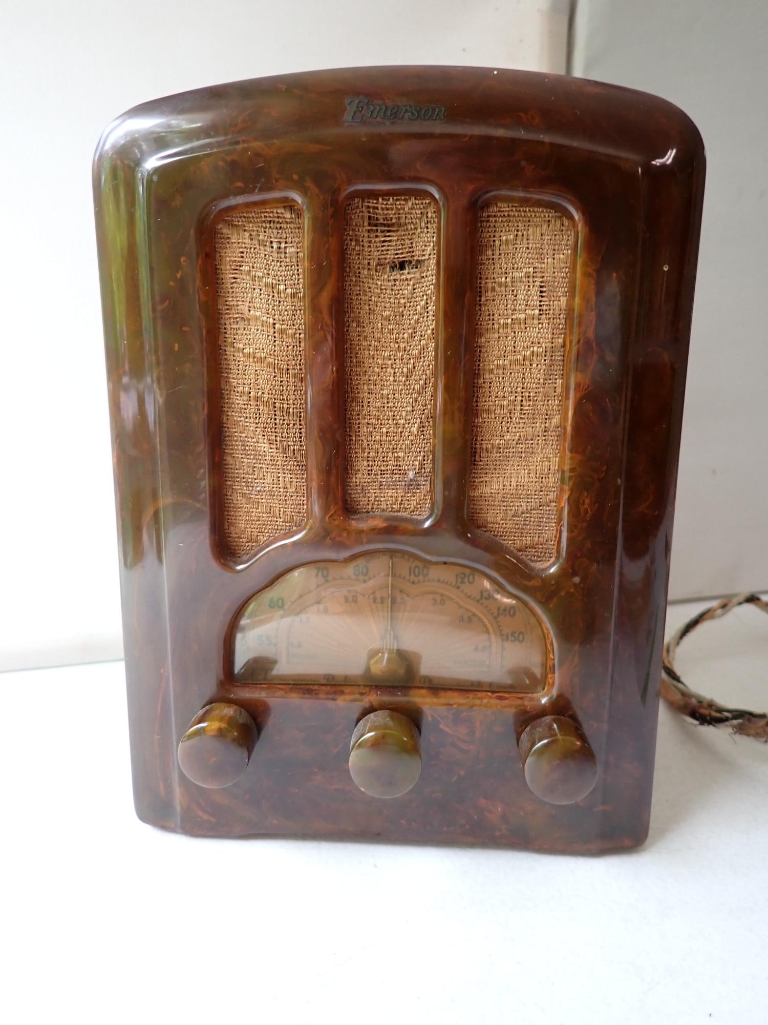 Emerson Catlin Tombstone Radio: Serial # AV-1673552. Case has no chips or cracks. Has small dots possibly paint. Minor scuffs. Speaker cloth has tearing. Needs electrical work. The radio hasn?t been tested and this should not be